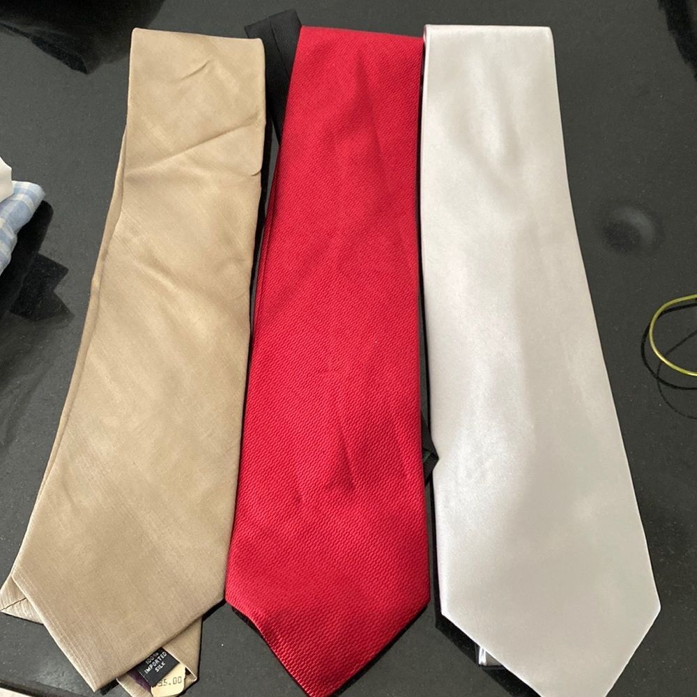 3 men’s ties dry cleaned 1 from Bugatti, Tommy Hilfiger and Pierre Cardin